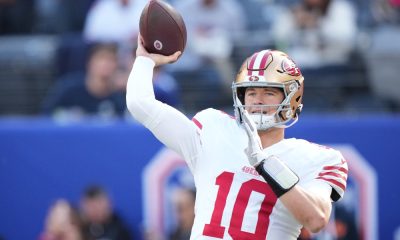 San Francisco 49ers quarterback Mac Jones throws a pass against the New York Giants