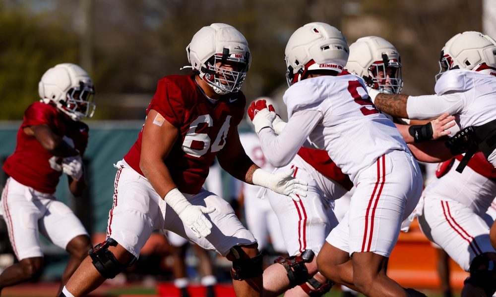 Alabama offensive lineman Michael Carroll pass sets at practice during spring football 2026