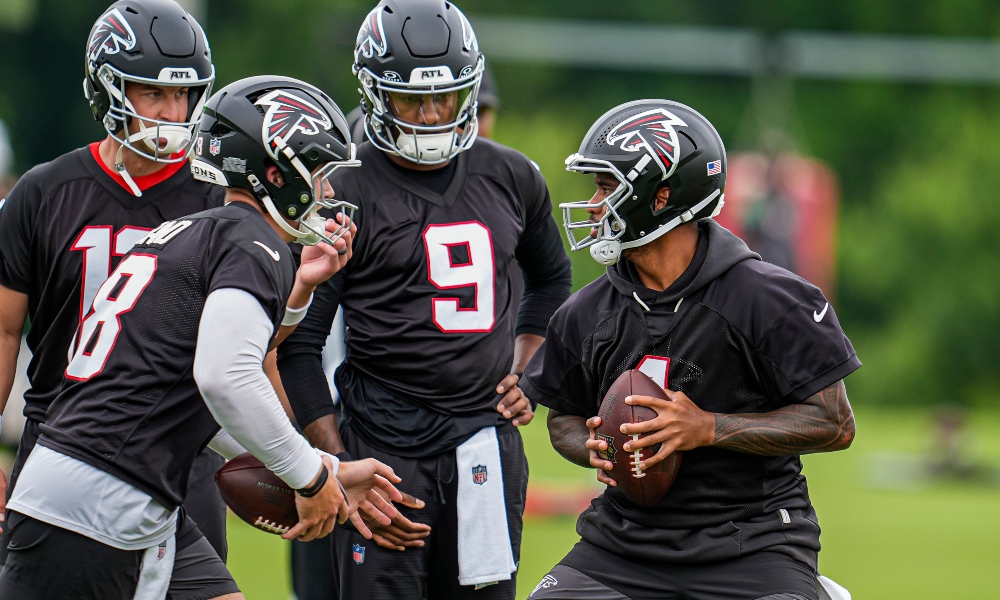 Atlanta Falcons quarterback Tua Tagovailoa drops back to pass during training camp.
