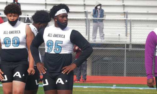 Alabama commit, Tyler Booker stretching at the Under Armour Camp